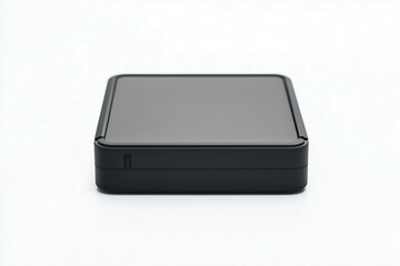 A sleek black portable external hard drive with a minimalist design, placed on a white surface.