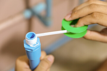 Concepts of how to use plumber (Teflon) Tape or PTFE thread tape for threaded connections pipes and...