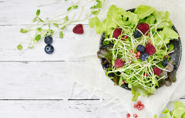 mixed salad on the grunge wooden table