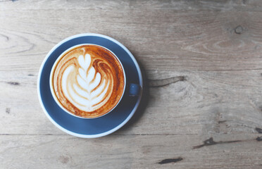 cup of coffee with art of late