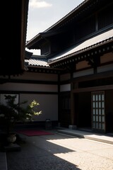 Fototapeta premium Sunlit Japanese courtyard with traditional architecture. (1)