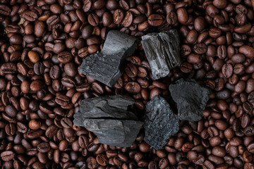 Coffee beans and charcoal, natural production concept