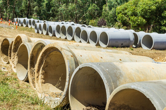 Large cement pipes laid out in rows