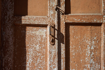 wooden door with peeling paint