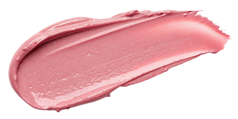 Smooth pink cream texture spread on a white surface for cosmetic use in beauty products