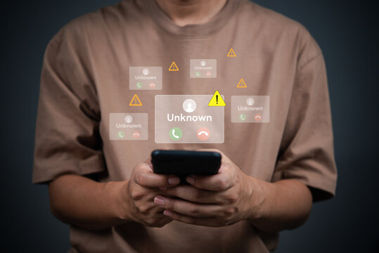 mobile user holding a phone incoming call alerts from unknown number, warning icons, signs and alert notifications, mobile security, privacy concerns, and call scams. phone security risks.