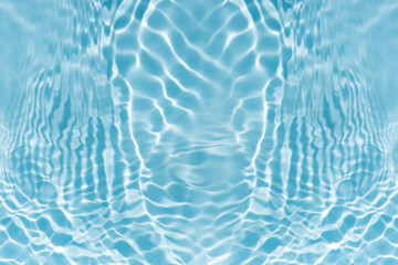 Blue water with ripples on the surface. Defocus blurred transparent blue colored clear calm water surface texture with splashes and bubbles. Water waves with shining pattern texture background.