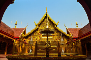 Fototapeta premium Pagoda and Chapel, Lanna Architecture, Symbols of Buddhism, South East Asia at Wat Khong Khao, Hang dong District Chiang Mai, Northern Thailand