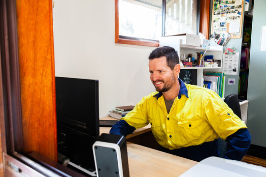 Person working on computer in home office