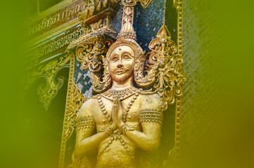 Fototapeta premium Thai Angel Statue Lanna Architecture, Symbols of Buddhism, South East Asia at Wat Khong Khao, Hang dong District Chiang Mai, Northern Thailand