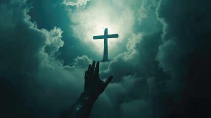 Naklejka premium A hand reaching towards a glowing cross amidst dramatic clouds, symbolizing hope and spirituality in a mystical setting