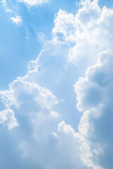 Bright blue sky with fluffy white clouds creating serene atmosphere