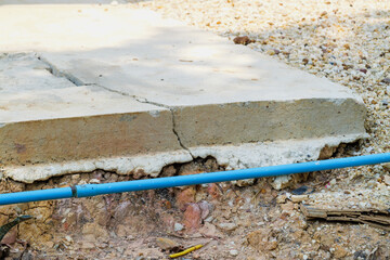 Structural integrity in urban construction cracked concrete slab and exposed pipe details