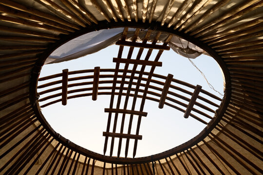 Looking up through the roof of a yurt