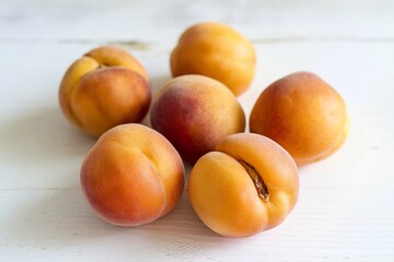 A photo of ripe apricots isolated on a white background