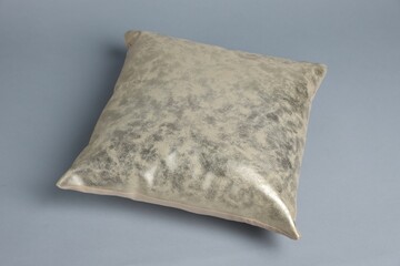 One soft decorative pillow on grey background