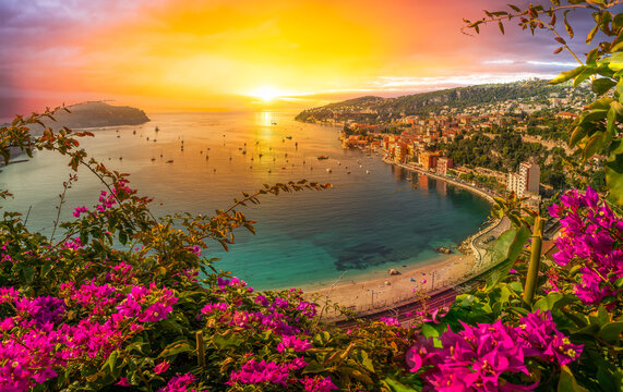 A vibrant view of Villefranche-sur-Mer on the French Riviera at sunset, France