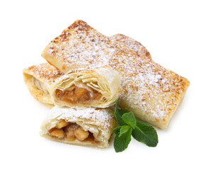 Tasty apple strudels with powdered sugar and mint isolated on white