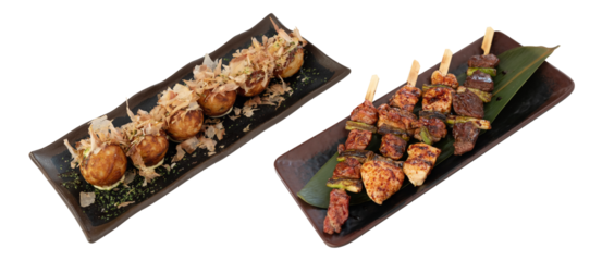 Japanese street food featuring grilled yakitori skewers with chicken, beef, and vegetables, alongside takoyaki topped with bonito flakes, served on traditional plates.