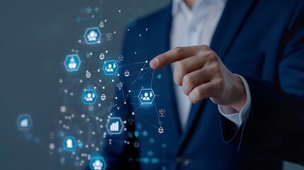 A business professional interacting with digital data and analytics in a modern workspace