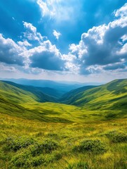 Fototapeta premium Expansive green valley under clouds