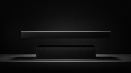 Obraz premium A sleek black speaker with a glossy finish, positioned on a black platform.