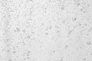 Refreshing soda water as background, closeup view
