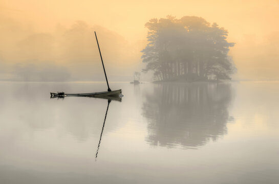Dead calm on Coniston water in the lake district Cumbria