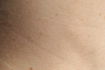 Fototapeta premium Texture of normal skin as background, closeup