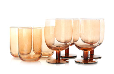 Many empty clean glasses isolated on white
