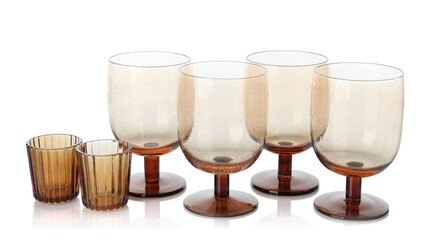 Many empty clean glasses isolated on white