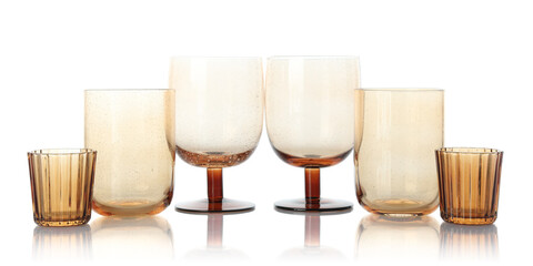Many empty clean glasses isolated on white