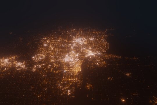 Aerial view on Detroit (USA) from south. Top view on modern city at night from satellite - Powered by Adobe