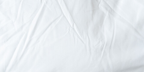 White bedsheet background, bed sheet texture, wrinkled duvet, crumpled satin blanket comforter cloth used in hotel, resort or home interior for bedding sleep comfort