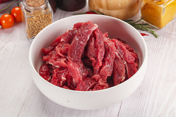 Raw beef meat - sliced strips