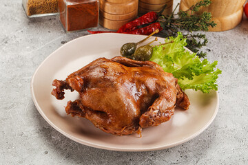 Baked small chicken with spices