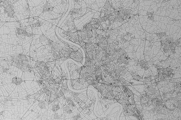Map of the streets of Dusseldorf (Germany) made with black lines on grey paper. Top view. 3d render, illustration