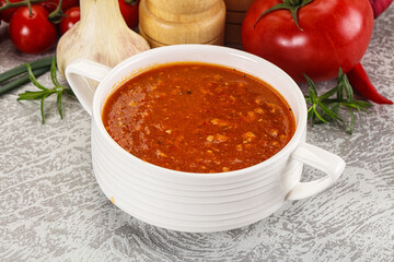 Hot tomato soup with diced chicken