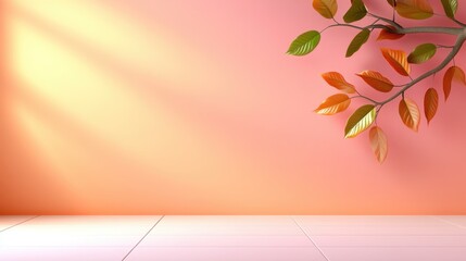 Autumn leaves branch with orange and green leaves on a pink wall background with soft sunlight. Pink surface in foreground provides copy space.