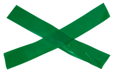 Isolated green cross made of electrical tape on white background