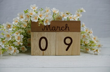 Wooden Calendar Showing the Date of March 9th. Day 9 of March month