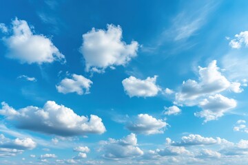 Obraz premium Blue sky with fluffy clouds