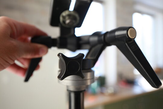 professional manfrotto tripod close up.Belarus, Chist, November 17, 2024.