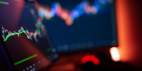 Abstract financial trading interface with dynamic stock market candlestick chart and blurry light...