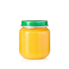 Baby food. Tasty puree in glass jar isolated on white