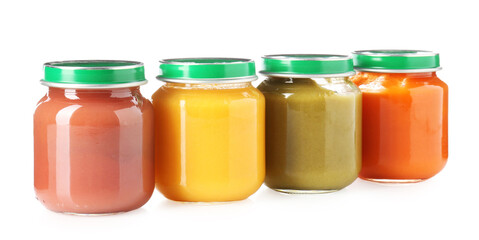 Baby food. Tasty puree in glass jars isolated on white