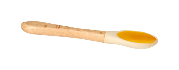 Baby food. Tasty puree in spoon isolated on white
