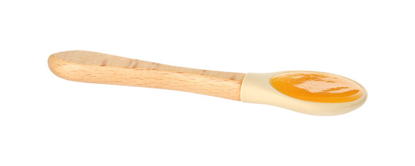 Baby food. Tasty puree in spoon isolated on white