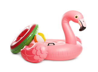 Colorful inflatable rings and ball on white background