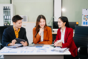 Professional teamwork as business colleagues engage in strategy, planning, and discussion